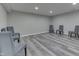 Basement showcasing luxury vinyl floors and neutral wall color, illuminated by recessed lighting at 2502 Colinbrook Pkwy, Greenwood, IN 46143
