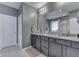 A spacious bathroom featuring granite countertops, dual sinks, and modern fixtures at 2502 Colinbrook Pkwy, Greenwood, IN 46143
