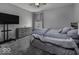 Comfortable bedroom with soft carpet, a large window and a dresser at 2502 Colinbrook Pkwy, Greenwood, IN 46143