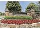 Stone entrance to Cobblestone community with decorative flowers and shrubs at 2502 Colinbrook Pkwy, Greenwood, IN 46143