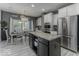 Well-appointed kitchen and dining area with stainless steel appliances and ample counter space at 2502 Colinbrook Pkwy, Greenwood, IN 46143