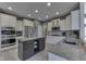 Modern kitchen features stainless appliances, granite countertops, and center island at 2502 Colinbrook Pkwy, Greenwood, IN 46143