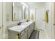 Bright bathroom boasts double sinks, modern faucets, and a clean, updated design at 2786 Longleaf Dr, Greenwood, IN 46143