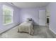 Bright bedroom featuring a window, carpet, and neutral decor to create a tranquil retreat at 2786 Longleaf Dr, Greenwood, IN 46143