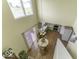 Aerial view of the dining area showcasing the open layout and modern kitchen appliances at 2786 Longleaf Dr, Greenwood, IN 46143