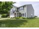 A view of a lovely home with neat landscaping, a spacious lawn, and a driveway at 2786 Longleaf Dr, Greenwood, IN 46143