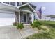 Inviting home entrance featuring well-kept landscaping, stone accents, and an American flag at 2786 Longleaf Dr, Greenwood, IN 46143
