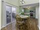 Sunlit eat-in kitchen with sliding doors to a deck and views of the yard at 2786 Longleaf Dr, Greenwood, IN 46143