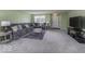 Cozy living room featuring carpeting and neutral paint, creating a relaxing atmosphere at 2786 Longleaf Dr, Greenwood, IN 46143
