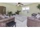 Spacious living room with plush sofas, natural lighting, and neutral walls at 2786 Longleaf Dr, Greenwood, IN 46143