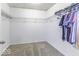 Spacious walk-in closet with carpeting, wire shelving and ample space for storage and organization at 2786 Longleaf Dr, Greenwood, IN 46143