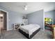 Cozy bedroom featuring neutral carpet, ample storage, and a convenient ensuite bathroom at 3010 Underwood Ct, Whiteland, IN 46184