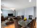 Open-concept living and dining area featuring modern decor and plenty of room for entertaining at 3010 Underwood Ct, Whiteland, IN 46184