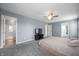 Spacious main bedroom with ensuite bathroom, ceiling fan and neutral walls for a calm and relaxing atmosphere at 3010 Underwood Ct, Whiteland, IN 46184
