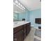 This bathroom features a double sink vanity, ceramic tile flooring, and ample space at 3068 Reflection Ct, Greenwood, IN 46143
