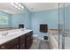 This bathroom boasts a double sink vanity, ceramic tile flooring, and soaking tub with shower at 3068 Reflection Ct, Greenwood, IN 46143