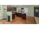 Modern kitchen featuring granite countertops, stainless steel appliances, and a breakfast bar at 3068 Reflection Ct, Greenwood, IN 46143