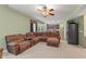 Spacious living area with an open layout, connecting to the kitchen, and comfortable seating at 3068 Reflection Ct, Greenwood, IN 46143