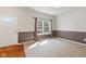 Bright living room featuring neutral paint, carpeted floors, and plenty of natural light at 3068 Reflection Ct, Greenwood, IN 46143