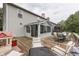 Home with a spacious backyard deck, screened in porch, and play area at 3714 Turfway Ct, Indianapolis, IN 46228