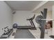 Finished basement with home gym including treadmill, weights, and exercise ball at 3714 Turfway Ct, Indianapolis, IN 46228