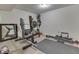 Basement gym with work out equipment and neutral colored flooring at 3714 Turfway Ct, Indianapolis, IN 46228