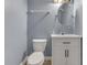 Bathroom featuring a modern vanity, toilet, and light fixture at 3714 Turfway Ct, Indianapolis, IN 46228
