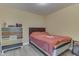 Bedroom with laminate flooring, colorful dresser, and neutral walls at 3714 Turfway Ct, Indianapolis, IN 46228
