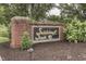 Saddlebrook South entrance sign featuring brick pillars and attractive landscaping at 3714 Turfway Ct, Indianapolis, IN 46228