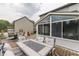 Relaxing deck with outdoor dining set, comfortable cushions, and view of the backyard at 3714 Turfway Ct, Indianapolis, IN 46228