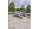 Comfortable outdoor seating area with a view of a tranquil pond at 3714 Turfway Ct, Indianapolis, IN 46228