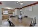 Bright dining area with traditional oak cabinets, table and decorative accents at 3714 Turfway Ct, Indianapolis, IN 46228