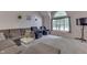 Cozy living room with large window, plush seating, and ample natural light at 3714 Turfway Ct, Indianapolis, IN 46228