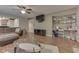 Open living area featuring a large sofa, a desk area, and modern furnishings at 3714 Turfway Ct, Indianapolis, IN 46228