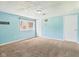Bedroom with light blue walls, carpet and bright natural light at 4020 N Mitthoefer Rd, Indianapolis, IN 46235