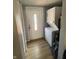 The laundry room contains the washer and dryer at 421 W Hendricks St, Shelbyville, IN 46176