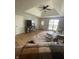 Inviting living room with vaulted ceilings, modern decor, and comfortable seating arrangement for relaxation and entertainment at 421 W Hendricks St, Shelbyville, IN 46176