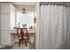 Neutral bathroom featuring vanity with desk area and patterned shower curtain at 4342 Sequoia Ct, Greenwood, IN 46143