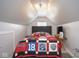 Cozy bedroom featuring an eye-catching quilt and an inviting atmosphere at 4342 Sequoia Ct, Greenwood, IN 46143