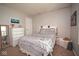 Bedroom featuring white dresser, mirror, and decorative bedding at 4342 Sequoia Ct, Greenwood, IN 46143