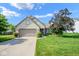Charming home with a two-car garage, beautiful landscaping, and a well-maintained lawn at 4342 Sequoia Ct, Greenwood, IN 46143