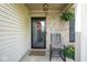 Close-up of the front door, showcasing a decorative wreath, charming details, and a welcoming ambiance at 4342 Sequoia Ct, Greenwood, IN 46143