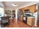 A kitchen featuring a refrigerator and black oven at 4342 Sequoia Ct, Greenwood, IN 46143