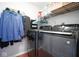 Modern laundry room with updated washer and dryer and ample storage at 4342 Sequoia Ct, Greenwood, IN 46143