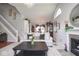 Cozy living room with high ceilings, fireplace, and view into the dining area at 4342 Sequoia Ct, Greenwood, IN 46143
