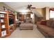 Spacious living room with a TV, hardwood cabinets, and cozy seating at 4342 Sequoia Ct, Greenwood, IN 46143