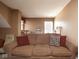 Comfortable living room with a brown couch and decorative pillows at 4342 Sequoia Ct, Greenwood, IN 46143