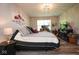 Comfortable bedroom featuring a decorative bed, TV and workstation at 4342 Sequoia Ct, Greenwood, IN 46143