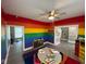 Colorful classroom with rainbow-themed walls, creating a vibrant and stimulating learning environment at 4402 E New York St, Indianapolis, IN 46201