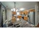 Eat-in kitchen featuring stainless steel appliances, oak cabinets, and luxury vinyl plank flooring at 441 E Pine Ridge Dr, Westfield, IN 46074